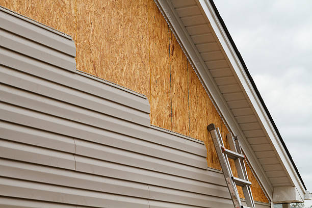 Professional Emergency Siding Repair technician working in Malden, MA